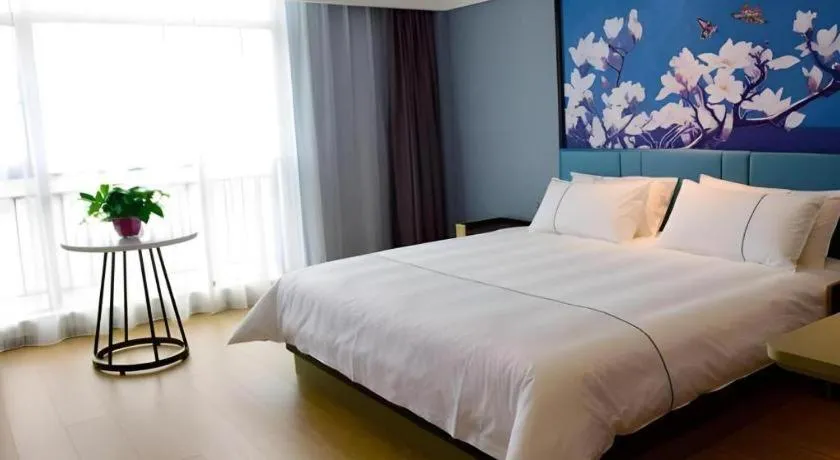 Bed in Magnotel Hotel Anshun West High-Speed Railway Station