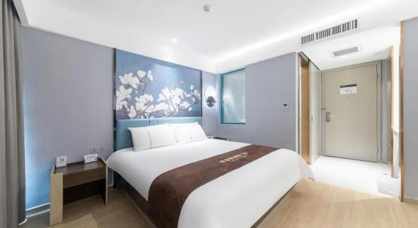 Bed in Magnotel Hotel Anshun West High-Speed Railway Station