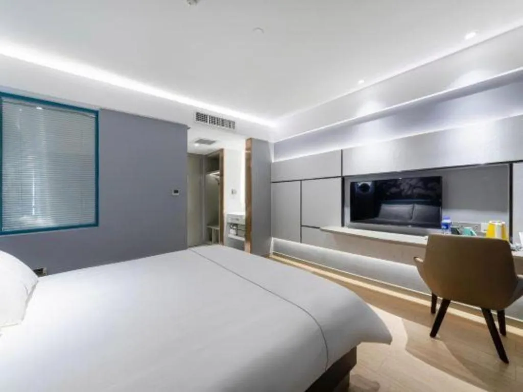 Bed in Magnotel Hotel Anshun West High-Speed Railway Station