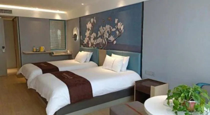 Bed in Magnotel Hotel Anshun West High-Speed Railway Station