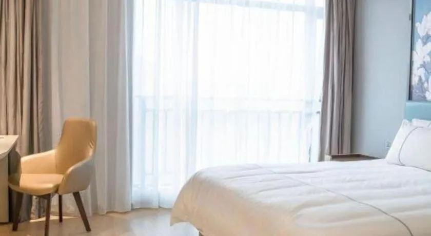 Bed in Magnotel Hotel Anshun West High-Speed Railway Station