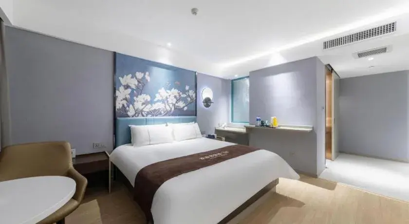 Bed in Magnotel Hotel Anshun West High-Speed Railway Station Bed in Magnotel Hotel Anshun West High-Speed Railway Station