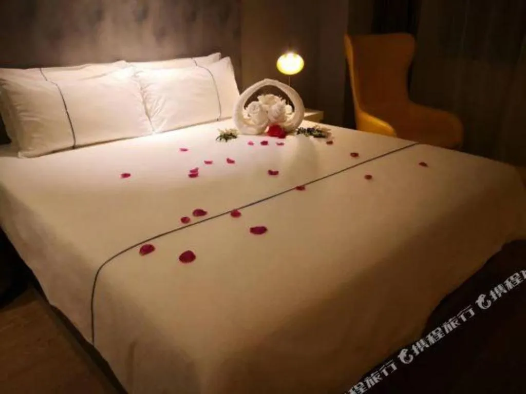 Bed in Magnotel Hotel Anshun West High-Speed Railway Station