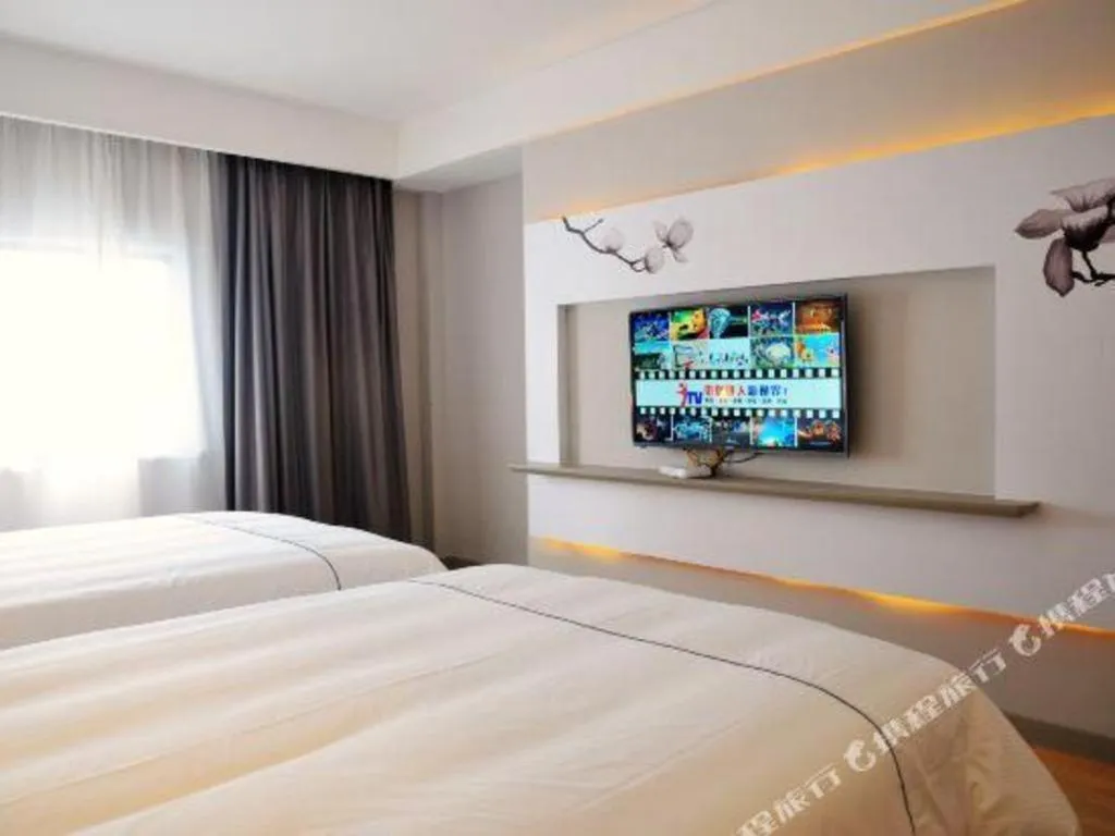 Bed in Magnotel Hotel Suzhou Guanqian Street Pingjiang Road