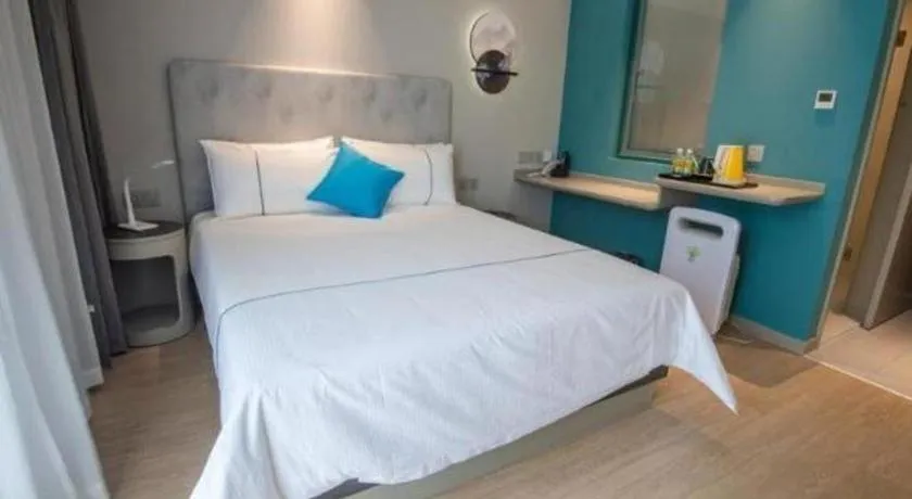 Bed in Magnotel Hotel Suzhou Guanqian Street Pingjiang Road