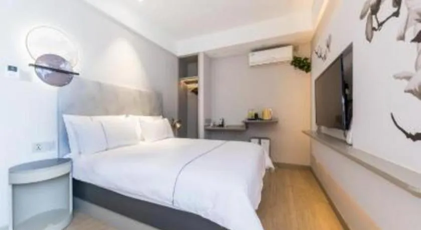 Bed in Magnotel Hotel Suzhou Guanqian Street Pingjiang Road