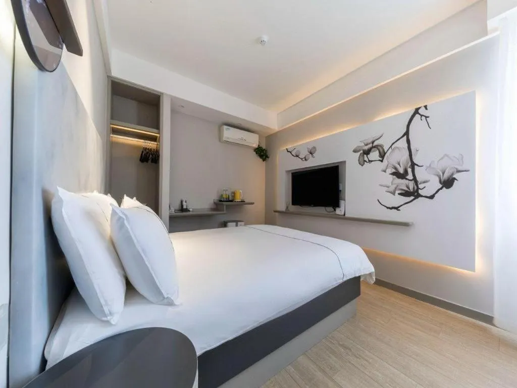 Bed in Magnotel Hotel Suzhou Guanqian Street Pingjiang Road