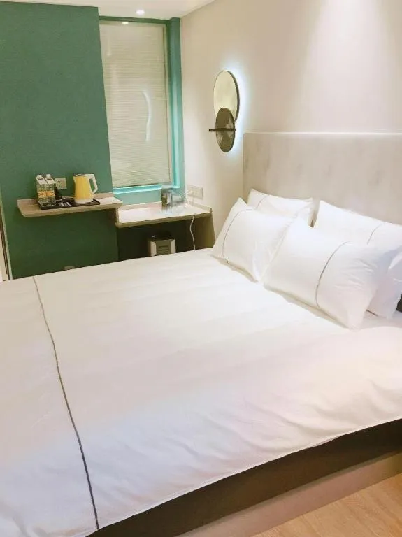 Bed in Magnotel Hotel Suzhou Guanqian Street Pingjiang Road