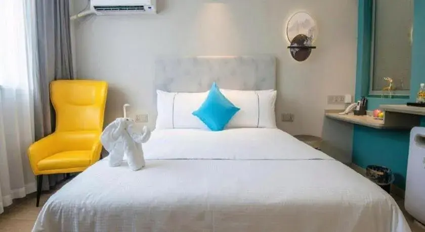 Bed in Magnotel Hotel Suzhou Guanqian Street Pingjiang Road Bed in Magnotel Hotel Suzhou Guanqian Street Pingjiang Road