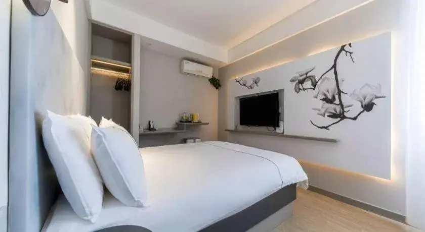 Bed in Magnotel Hotel Suzhou Guanqian Street Pingjiang Road Bed in Magnotel Hotel Suzhou Guanqian Street Pingjiang Road