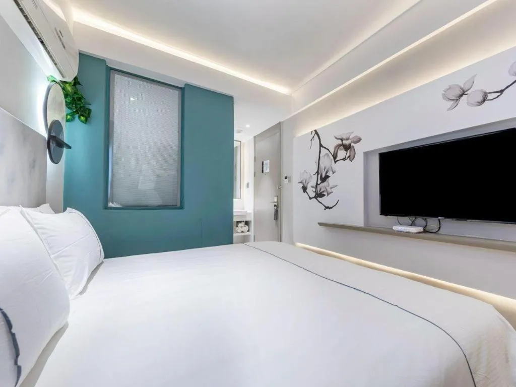 Bed in Magnotel Hotel Suzhou Guanqian Street Pingjiang Road