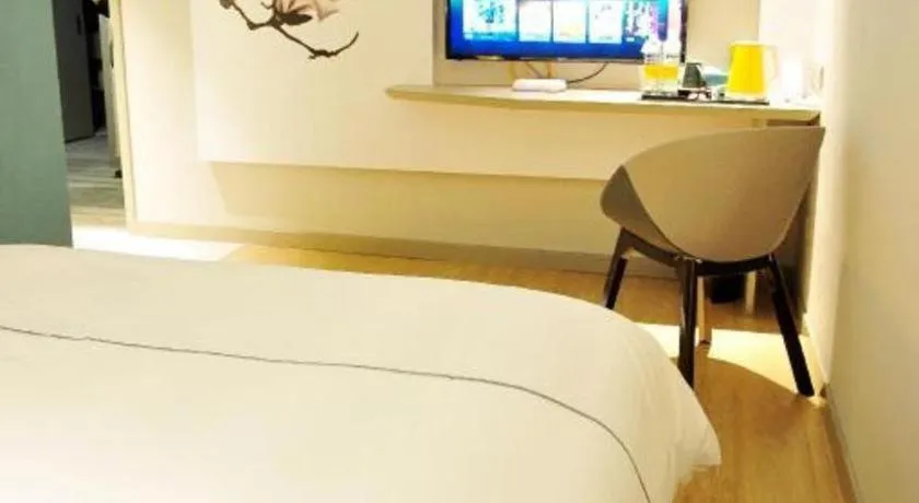 Bed in Magnotel Hotel Suzhou Guanqian Street Pingjiang Road