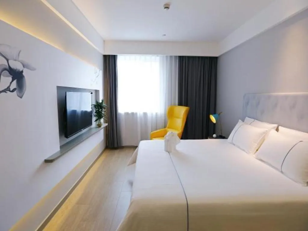 Bed in Magnotel Hotel Suzhou Guanqian Street Pingjiang Road