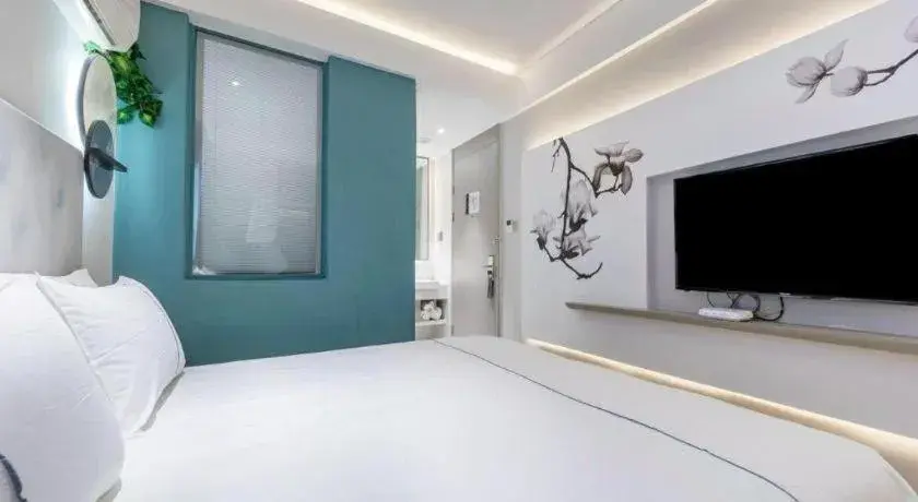 Bed in Magnotel Hotel Suzhou Guanqian Street Pingjiang Road Bed in Magnotel Hotel Suzhou Guanqian Street Pingjiang Road