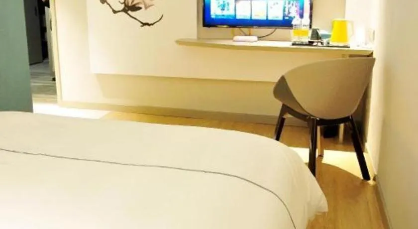 Bed in Magnotel Hotel Suzhou Guanqian Street Pingjiang Road