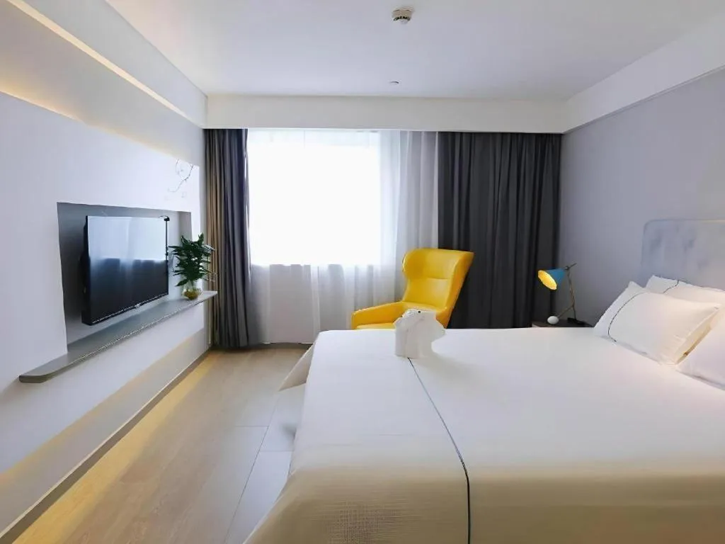 Bed in Magnotel Hotel Suzhou Guanqian Street Pingjiang Road