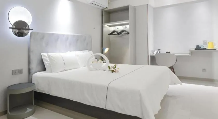 Bed in Magnotel Hotel Jining Yanzhou Metro Station Jiuxianqiao South Road