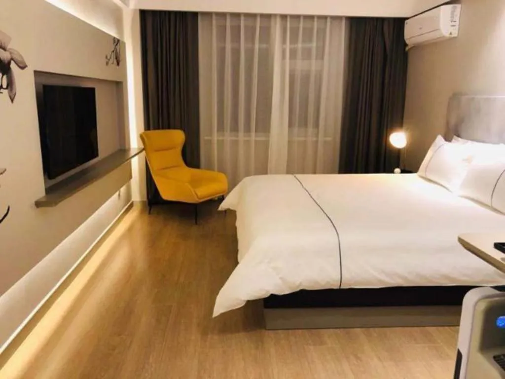 Bed in Magnotel Hotel Jining Yanzhou Metro Station Jiuxianqiao South Road