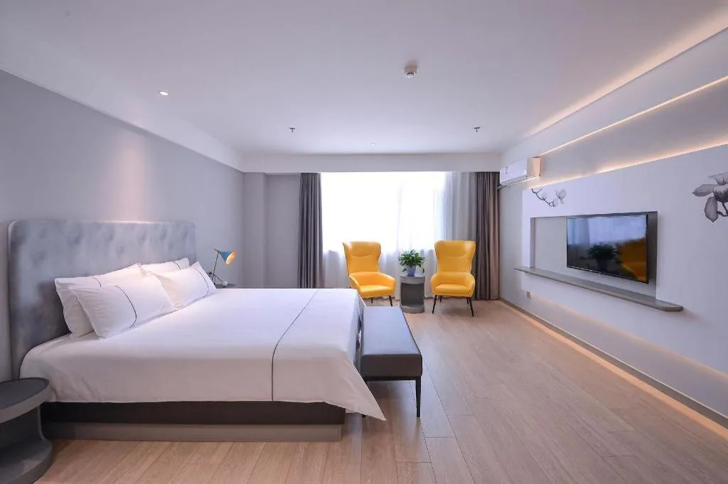 Bed in Magnotel Hotel Jining Yanzhou Metro Station Jiuxianqiao South Road