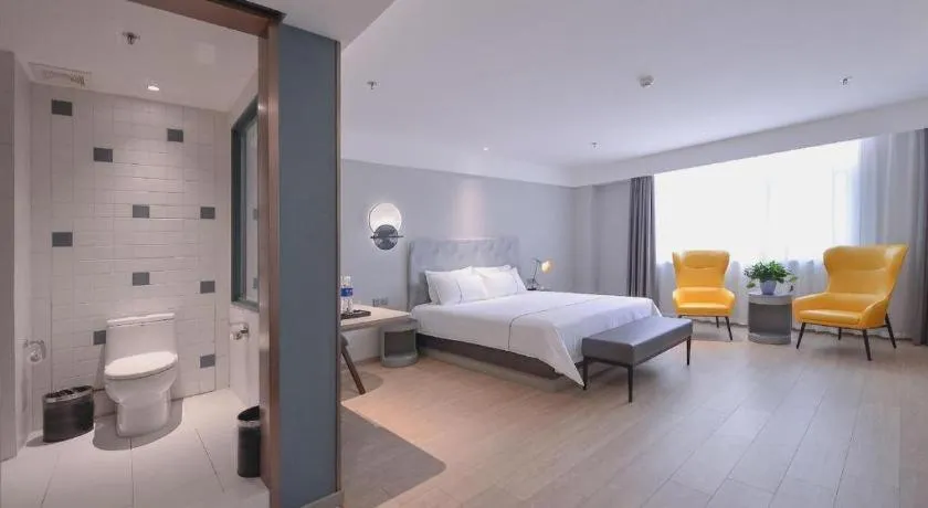 Bed in Magnotel Hotel Jining Yanzhou Metro Station Jiuxianqiao South Road