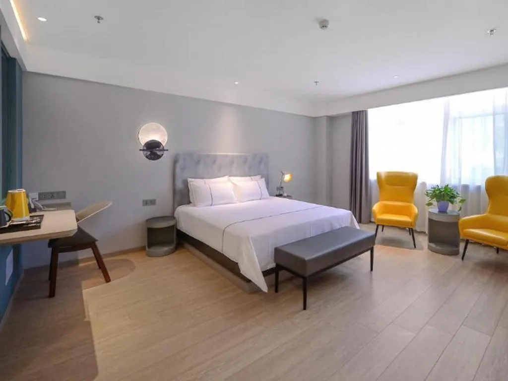 Bed in Magnotel Hotel Jining Yanzhou Metro Station Jiuxianqiao South Road