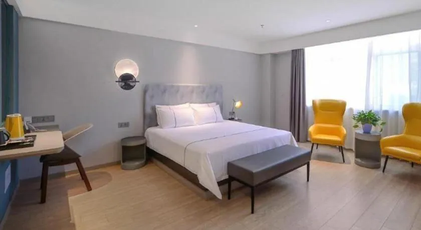 Bed in Magnotel Hotel Jining Yanzhou Metro Station Jiuxianqiao South Road