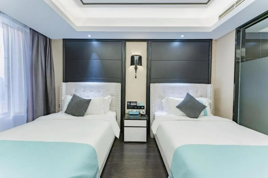 Bed in Xana Hotelle Zhengzhou North Passenger Terminal North University Town