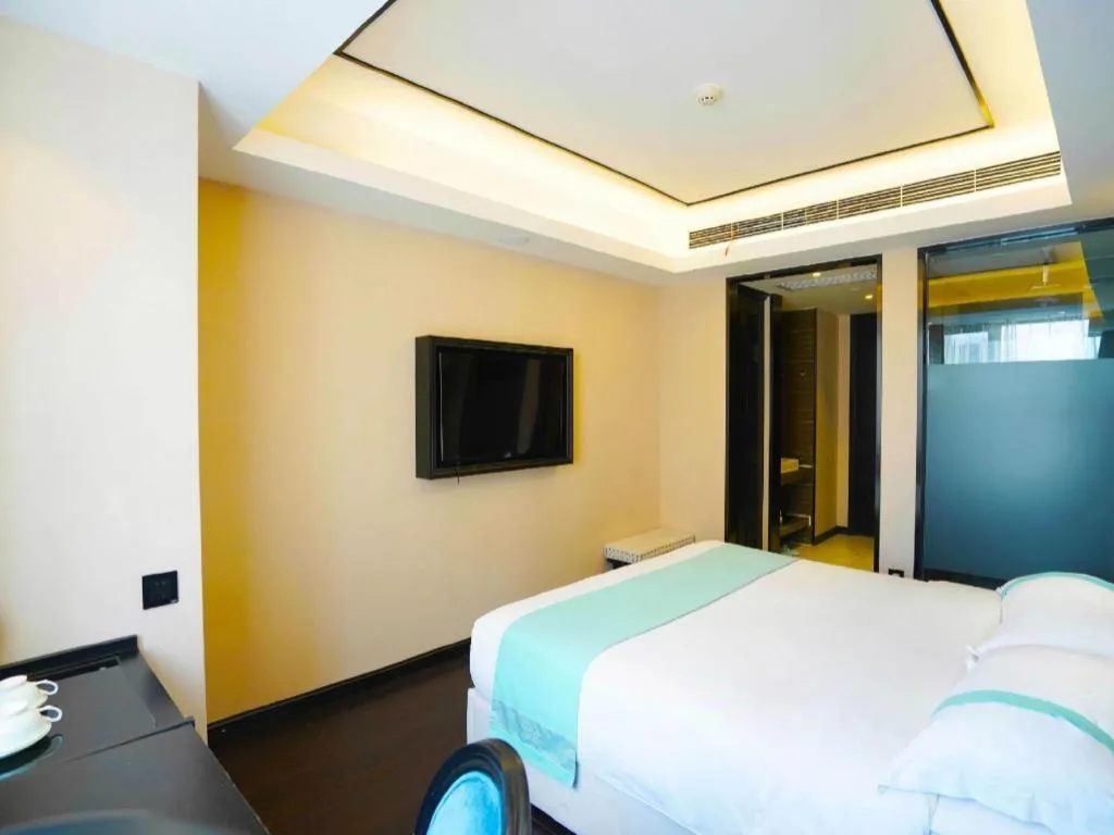 Bed in Xana Hotelle Zhengzhou North Passenger Terminal North University Town