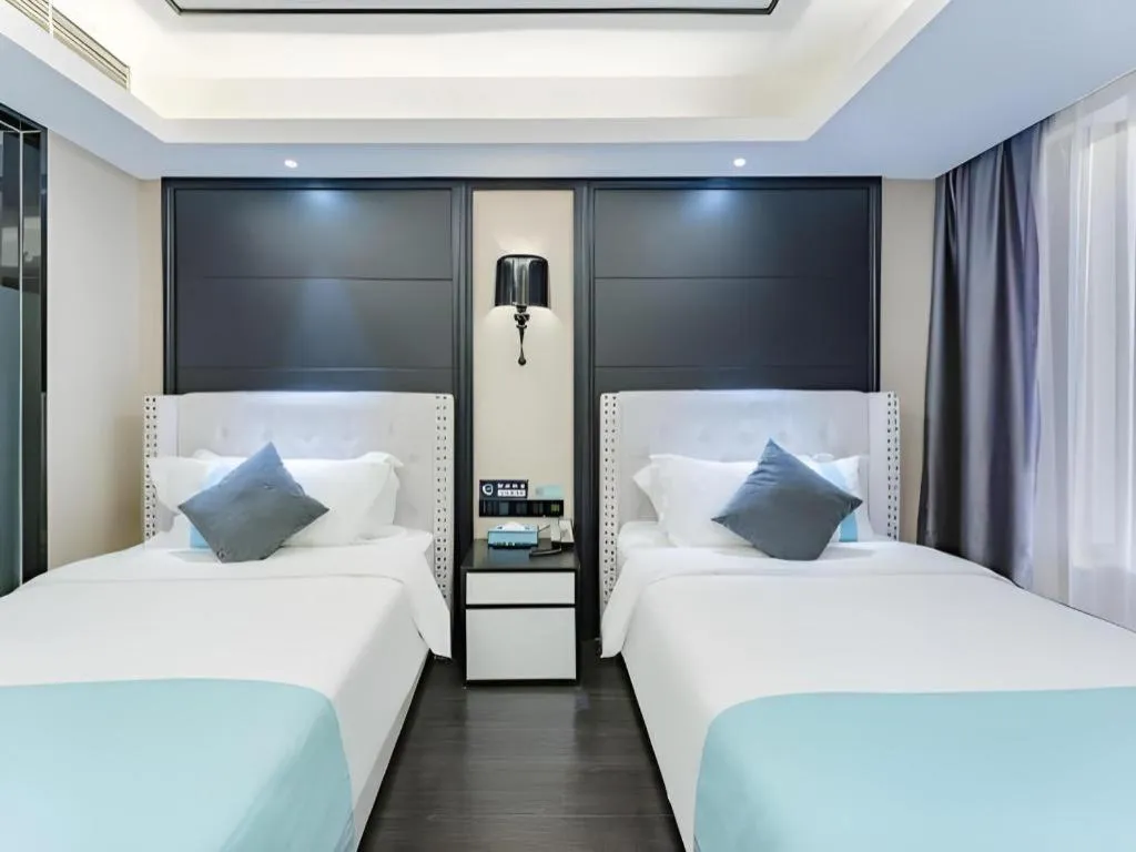 Bed in Xana Hotelle Zhengzhou North Passenger Terminal North University Town