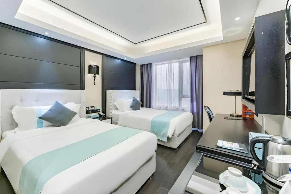 Bed in Xana Hotelle Zhengzhou North Passenger Terminal North University Town