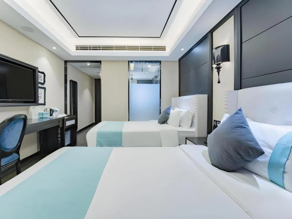 Bed in Xana Hotelle Zhengzhou North Passenger Terminal North University Town