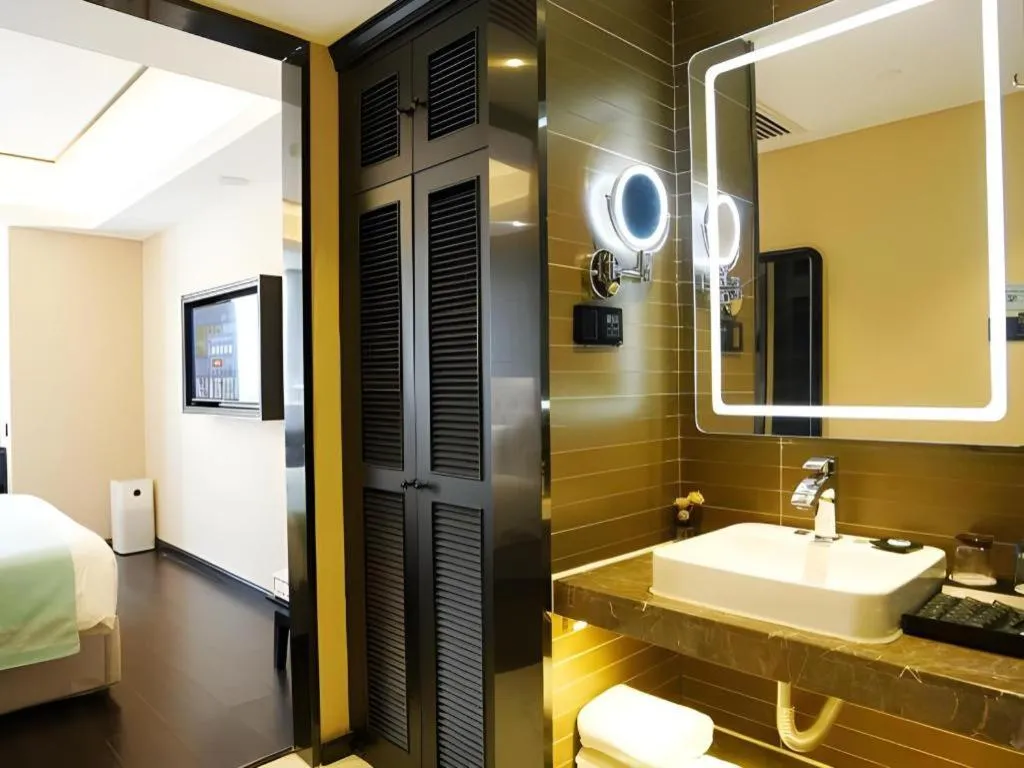 Bed in Xana Hotelle Zhengzhou North Passenger Terminal North University Town