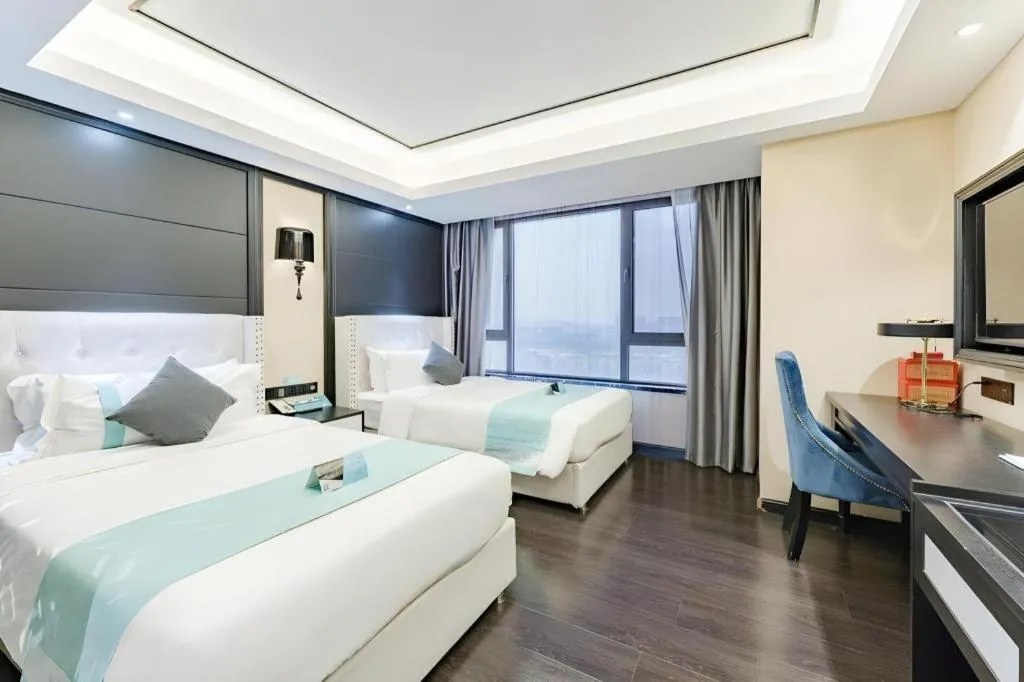 Bed in Xana Hotelle Zhengzhou North Passenger Terminal North University Town