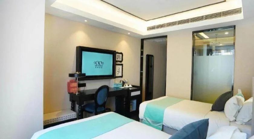 Bed in Xana Hotelle Zhengzhou North Passenger Terminal North University Town