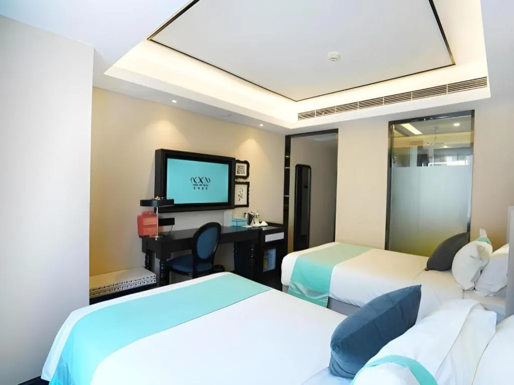 Bed in Xana Hotelle Zhengzhou North Passenger Terminal North University Town