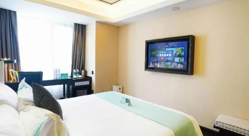 Bed in Xana Hotelle Zhengzhou North Passenger Terminal North University Town