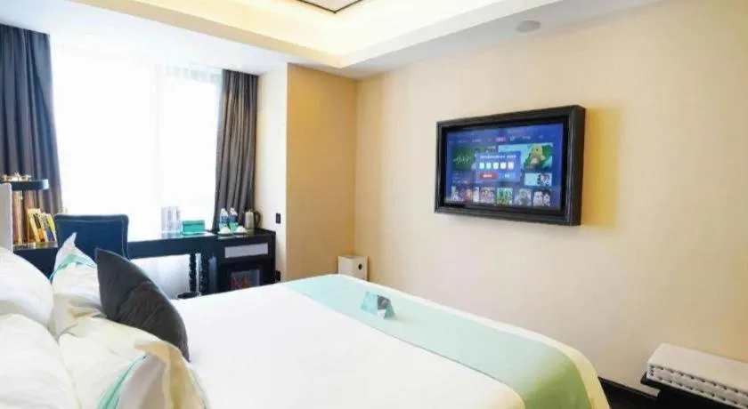 Bed in Xana Hotelle Zhengzhou North Passenger Terminal North University Town