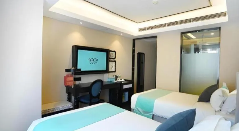 Bed in Xana Hotelle Zhengzhou North Passenger Terminal North University Town