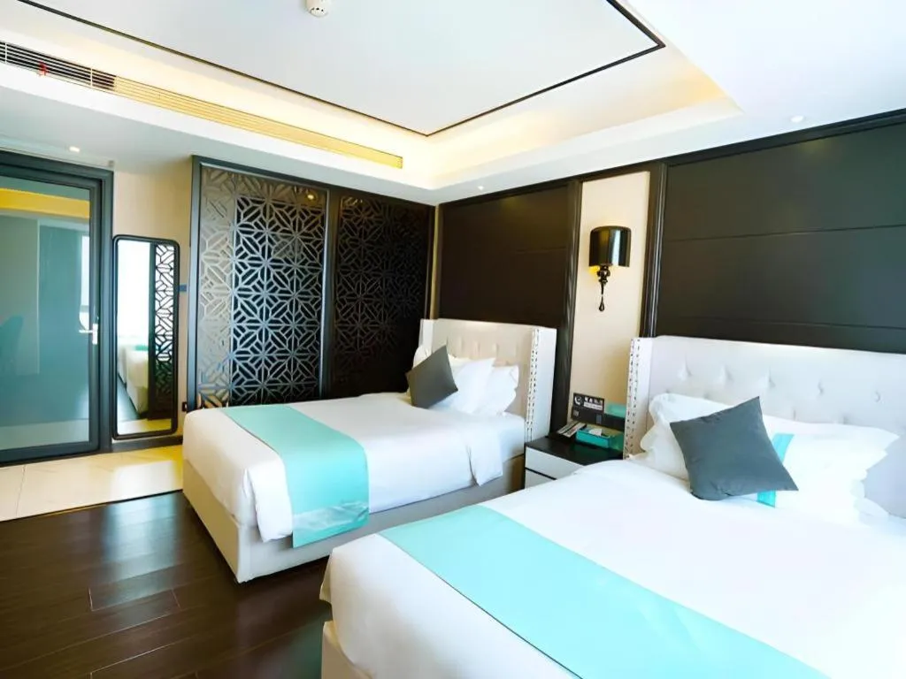 Bed in Xana Hotelle Zhengzhou North Passenger Terminal North University Town