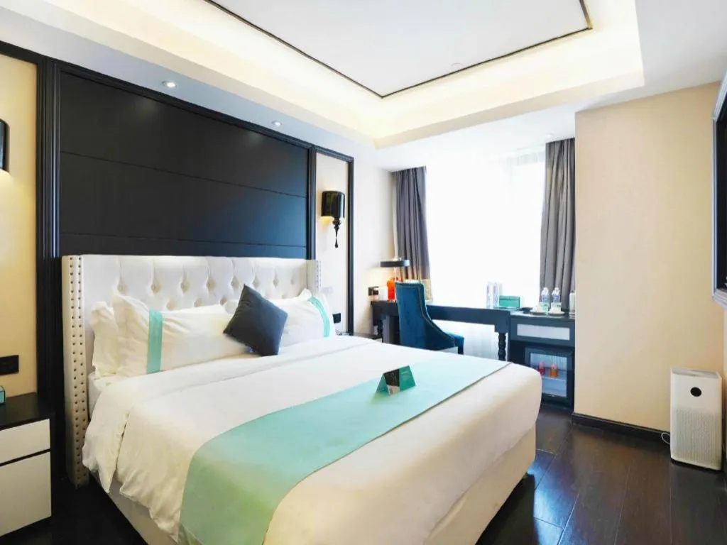 Bed in Xana Hotelle Zhengzhou North Passenger Terminal North University Town