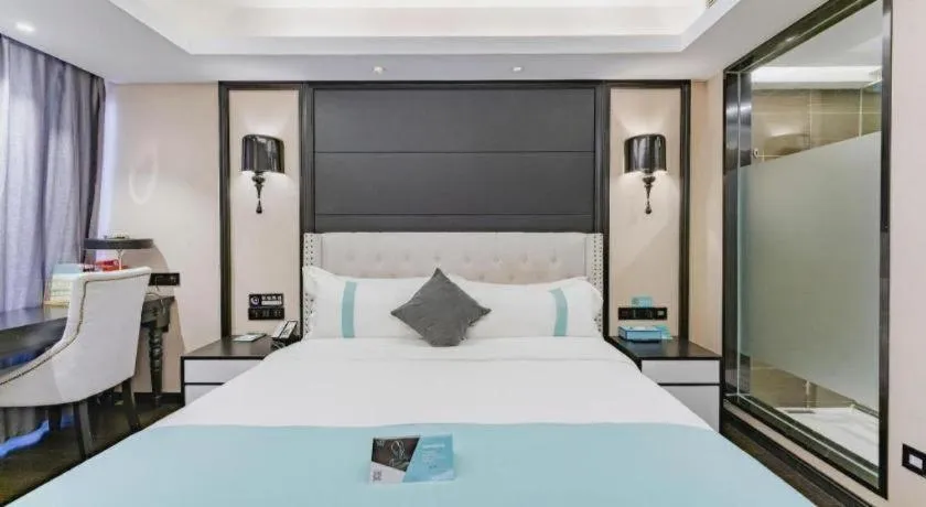 Bed in Xana Hotelle Zhengzhou North Passenger Terminal North University Town