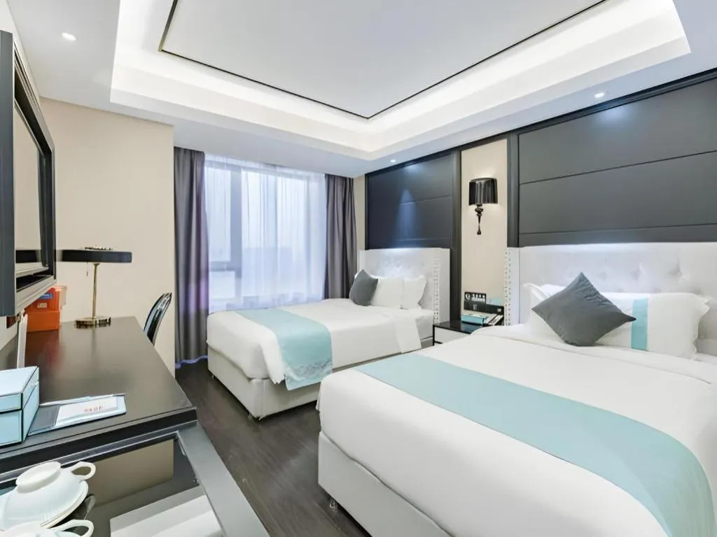 Bed in Xana Hotelle Zhengzhou North Passenger Terminal North University Town