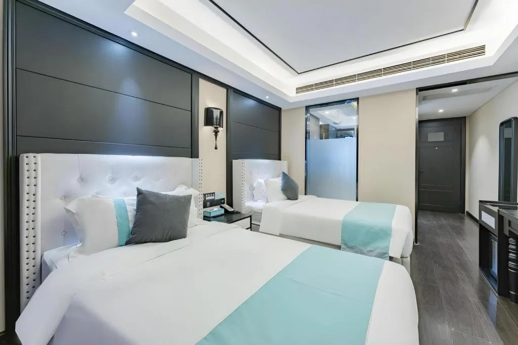 Bed in Xana Hotelle Zhengzhou North Passenger Terminal North University Town