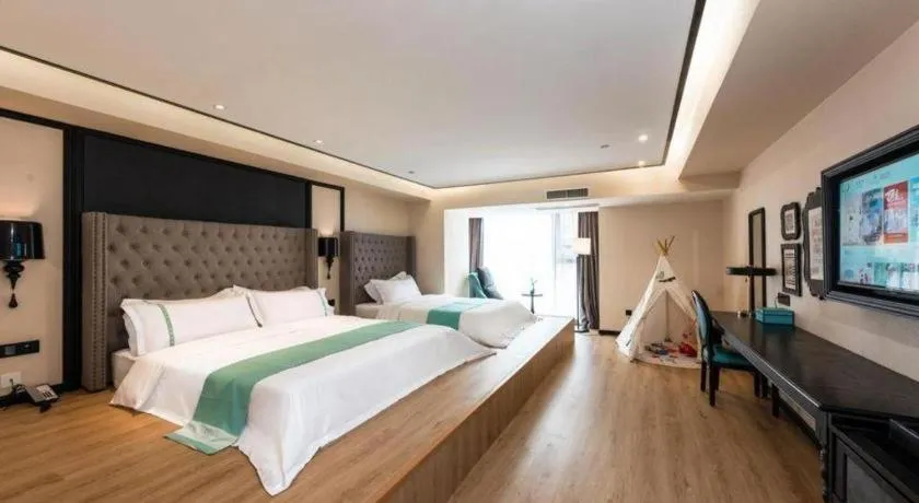 Bed in Xana Hotelle Chengdou Xindu Sanhechang Metro Station