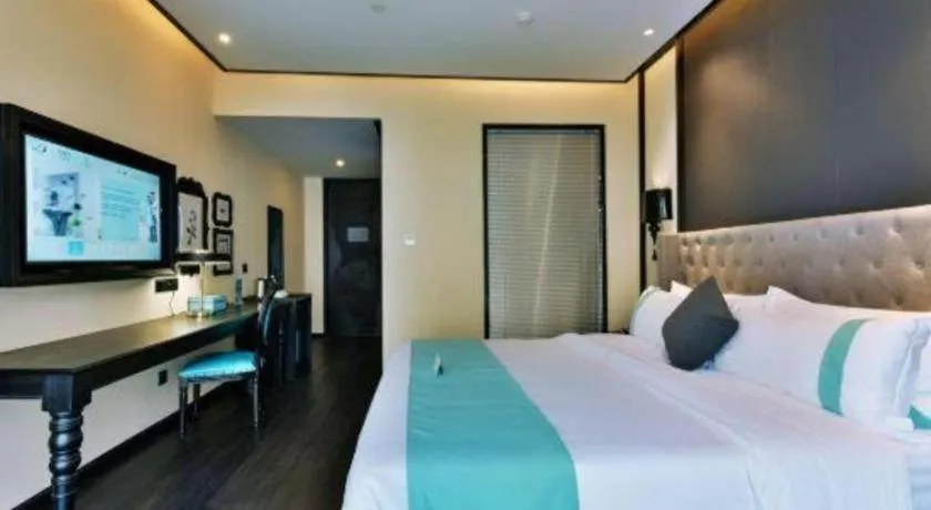 Bed in Xana Hotelle Chengdou Xindu Sanhechang Metro Station