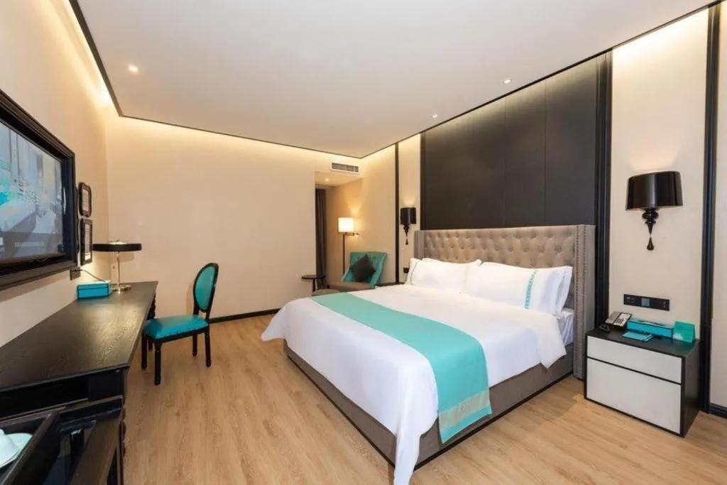 Bed in Xana Hotelle Chengdou Xindu Sanhechang Metro Station