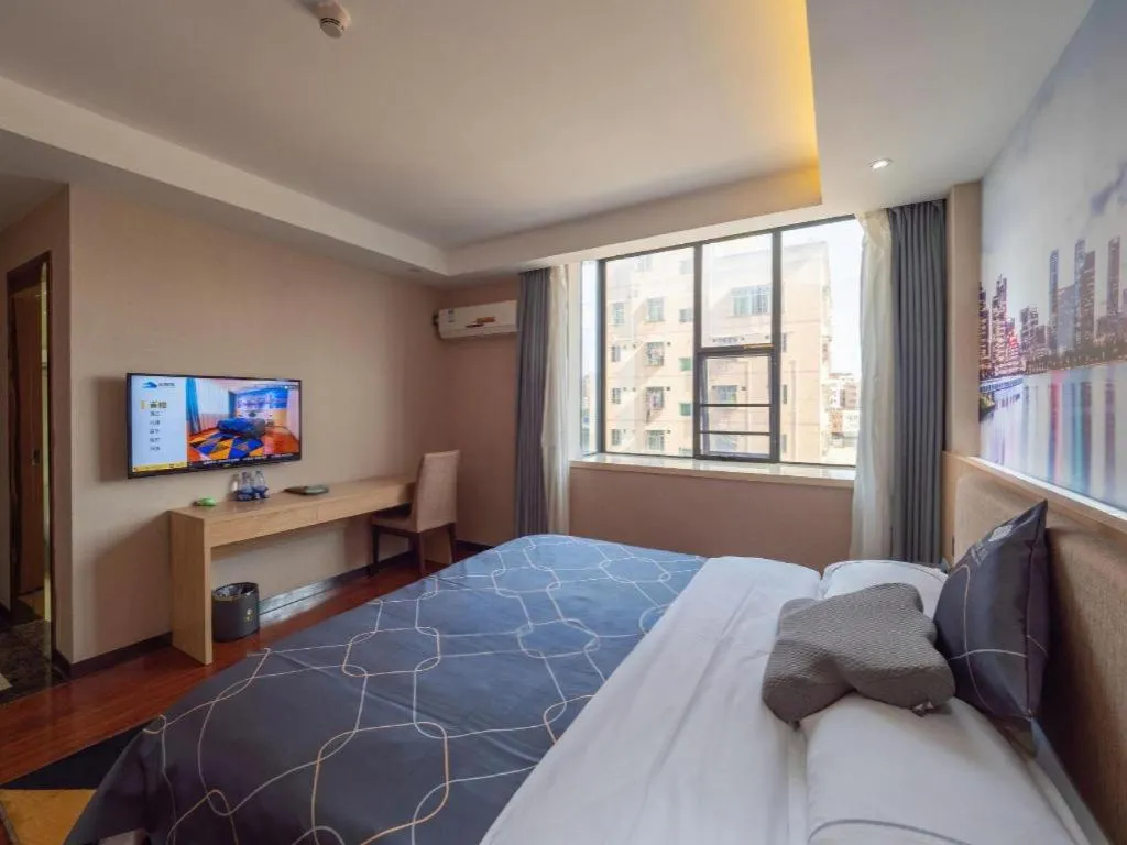 Bed in Chonpines Hotel Shenzhen Gongming Honghuashan Metro Station