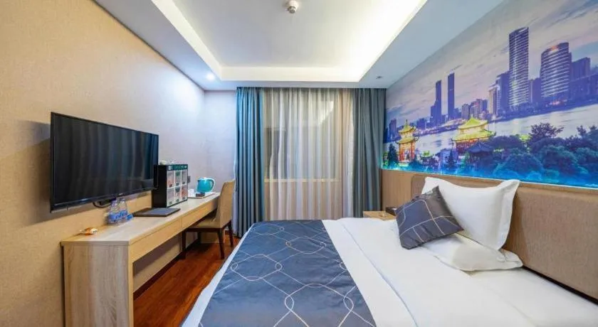 Bed in Chonpines Hotel Shenzhen Gongming Honghuashan Metro Station