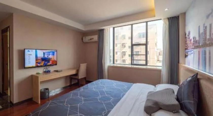 Bed in Chonpines Hotel Shenzhen Gongming Honghuashan Metro Station