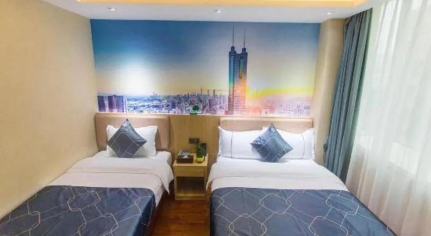 Bed in Chonpines Hotel Shenzhen Gongming Honghuashan Metro Station